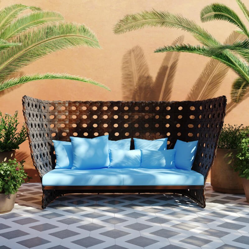 outdoor sofa with blue cushions and pillows